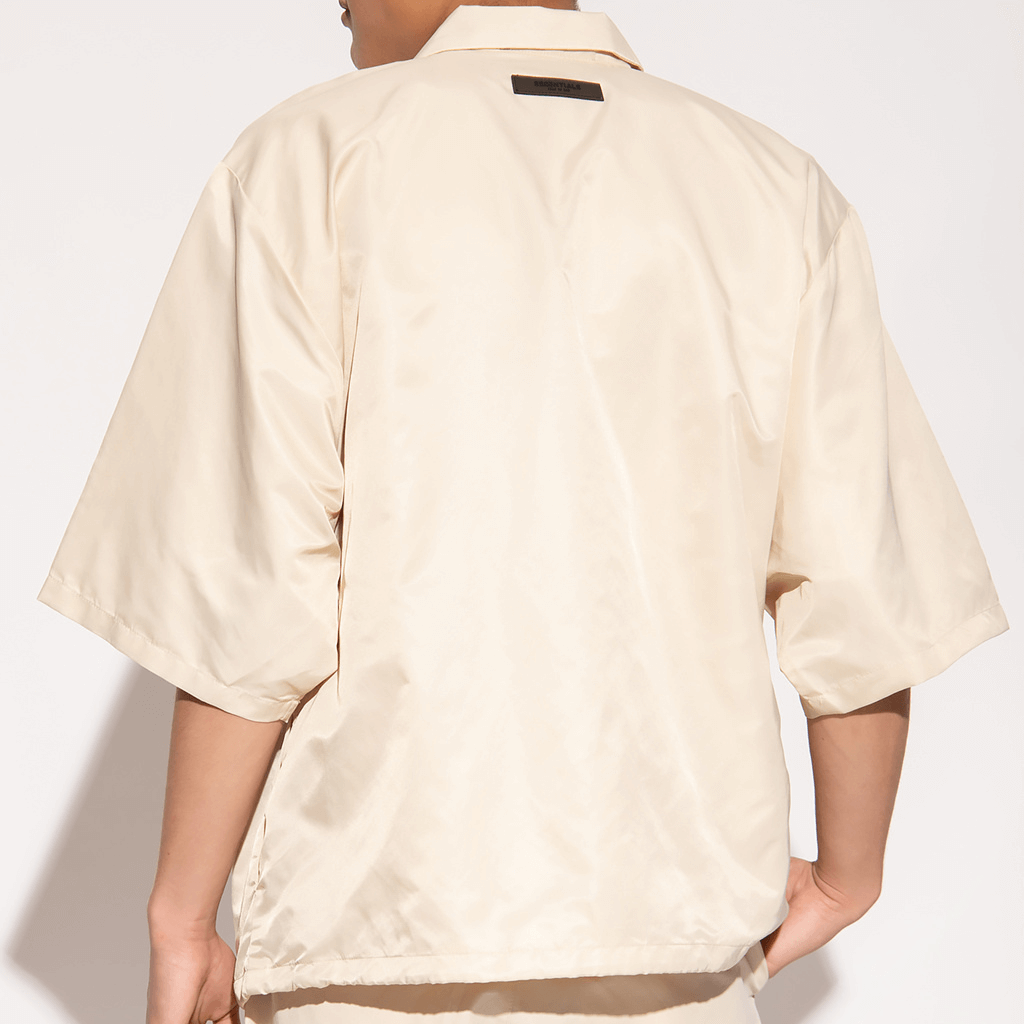 FEAR OF GOD ESSENTIALS CAMISA NYLON OVERSIZE BEIGE