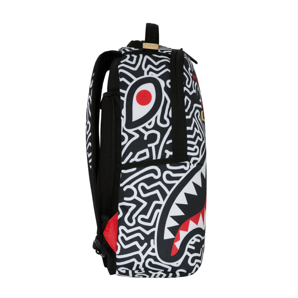 MORRAL SPRAYGROUND KEITH HARRING SKATER GUY PRINT DLXSV BACKPACK