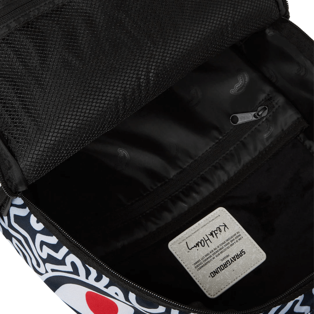 MORRAL SPRAYGROUND KEITH HARRING SKATER GUY PRINT DLXSV BACKPACK