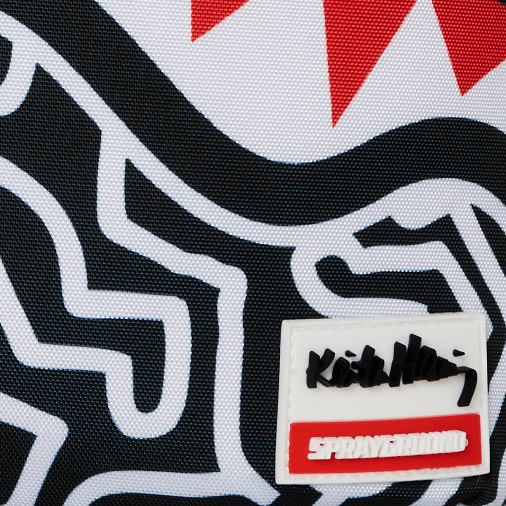 MORRAL SPRAYGROUND KEITH HARRING SKATER GUY PRINT DLXSV BACKPACK