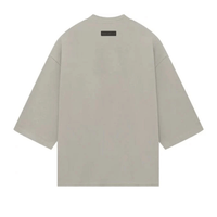 FEAR OF GOD ESSENTIALS JERSEY OVERSIZED GRIS