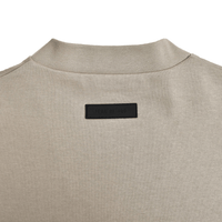 FEAR OF GOD ESSENTIALS JERSEY OVERSIZED GRIS