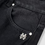 MONOIC TUTTO BENE I FLARED JEANS NEGRO DESGASTADO