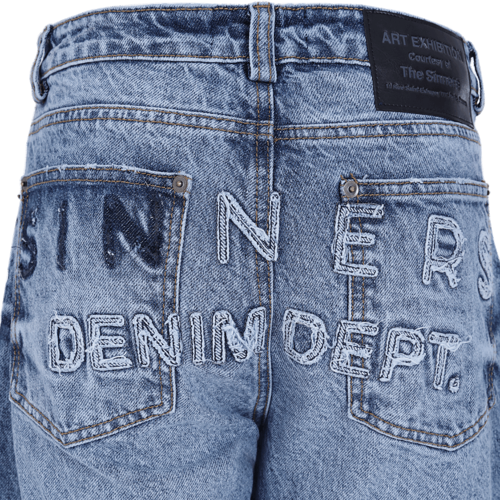 SINNERS EMBROIREDED FLARED JEANS