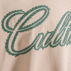 CULTURE WISE PASS THE LOVE CAMISETA OVERSIZED CAMEL WEED CURSIVE LOGO