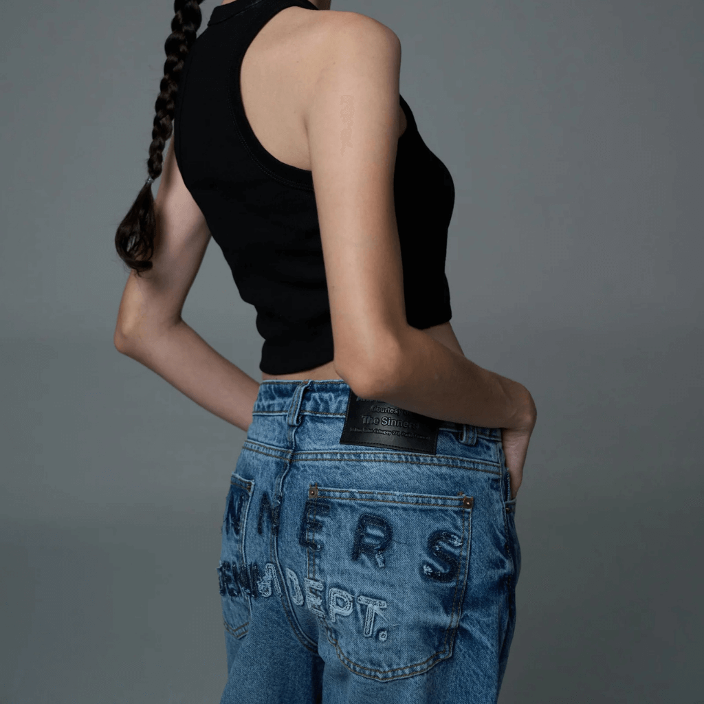 SINNERS EMBROIREDED FLARED JEANS