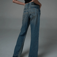 SINNERS DIRTY FLARED JEANS