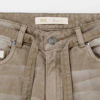 TRUE DIRTY-WASH MID-RISE PANTALON BEIGE