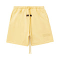 FEAR OF GOD ESSENTIALS SHORT DE ALGODON AMARILLO TULCAN
