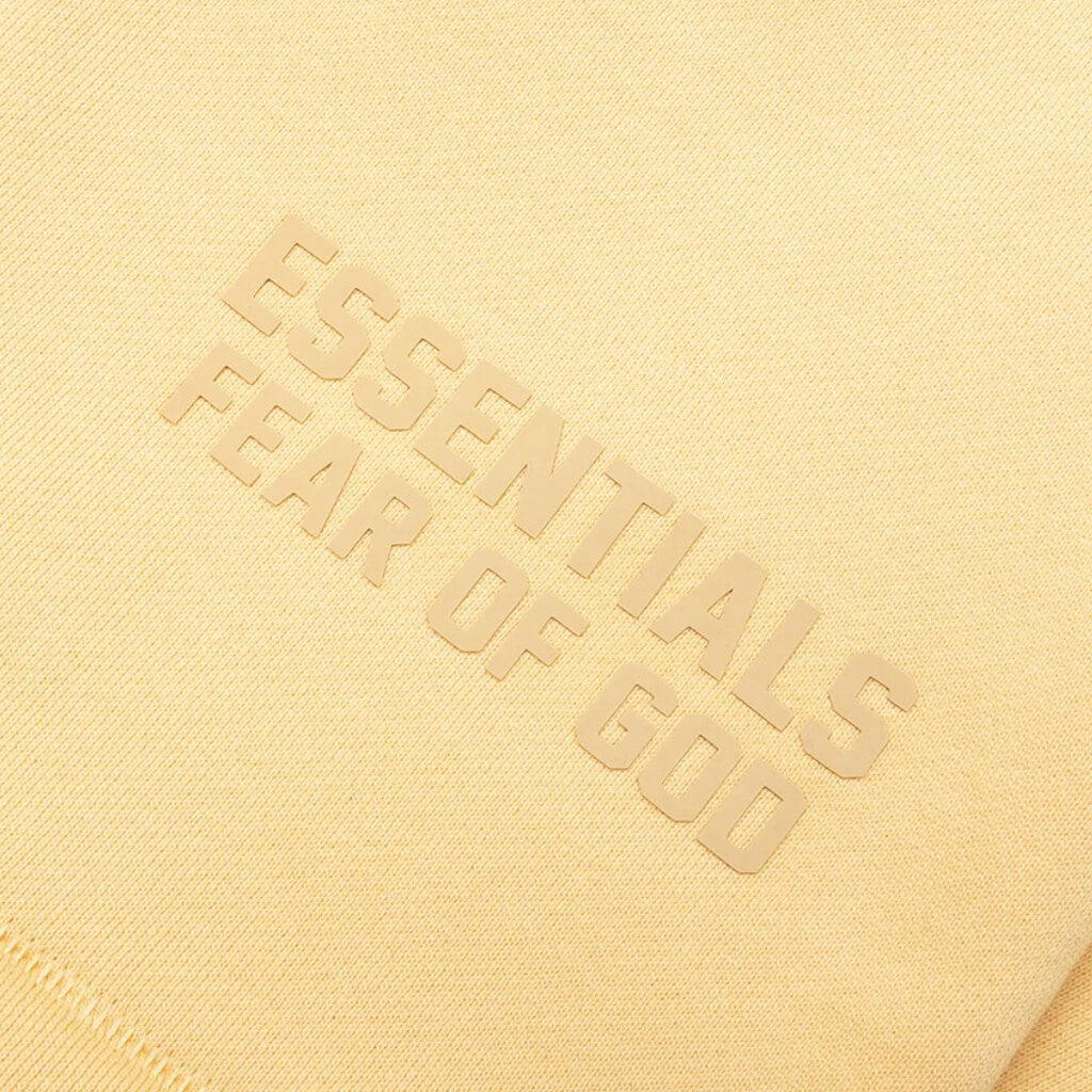 FEAR OF GOD ESSENTIALS SHORT DE ALGODON AMARILLO TULCAN