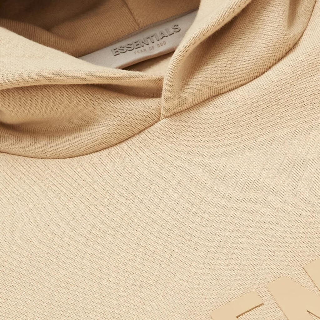 FEAR OF GOD ESSENTIALS BUZO OVERSIZE BEIGE ARENA