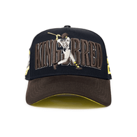 KINGS BRED X RIMAS SPORTS TATIS JR 23 GORRA AJUSTABLE NEGRA / CAFE