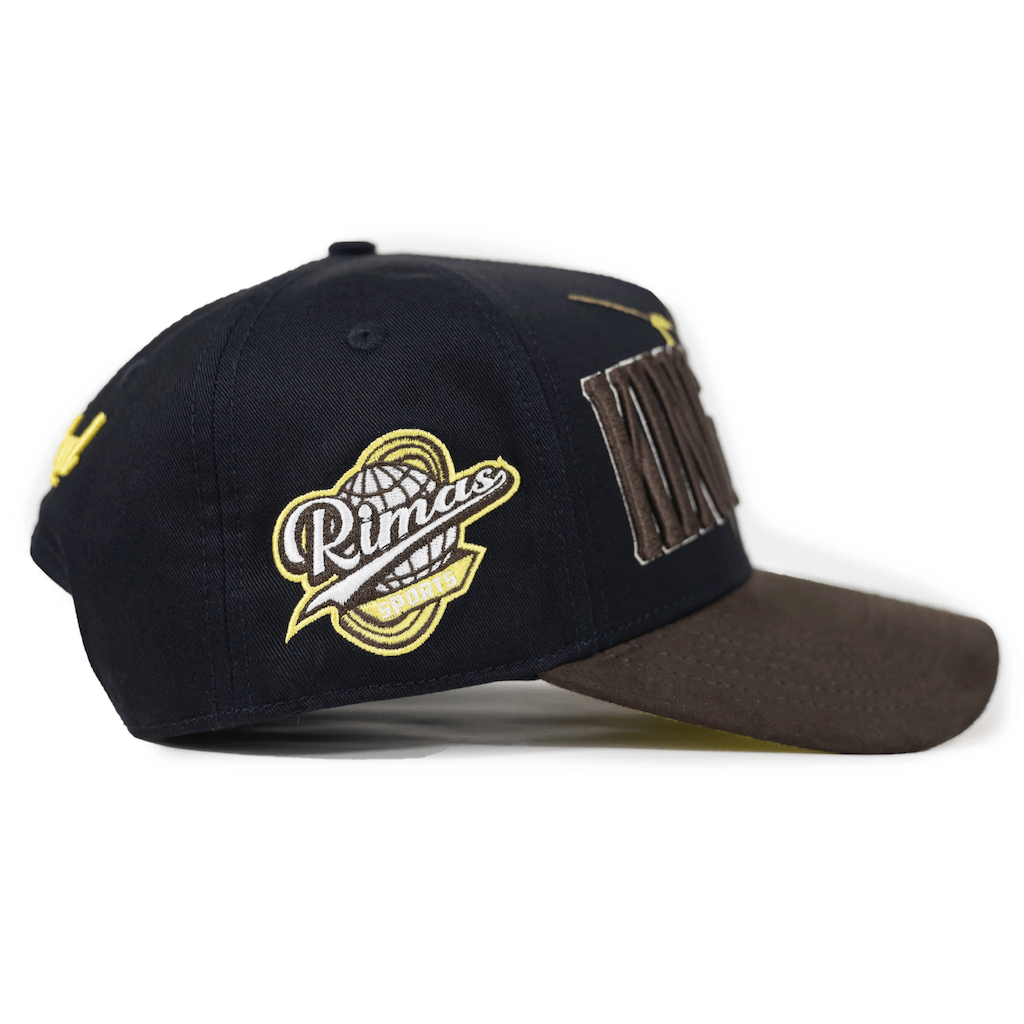 KINGS BRED X RIMAS SPORTS TATIS JR 23 GORRA AJUSTABLE NEGRA / CAFE