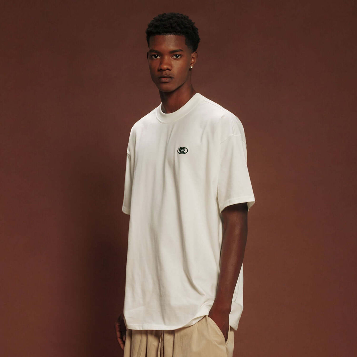 TRUE UNIFORM CAMISETA OVERSIZE BEIGE