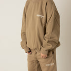 FEAR OF GOD ESSENTIALS SACO OVERSIZE CANELA