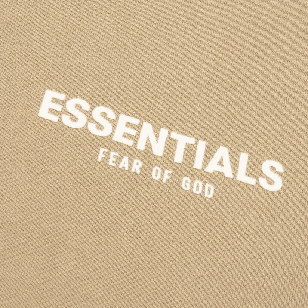 FEAR OF GOD ESSENTIALS SACO OVERSIZE CANELA